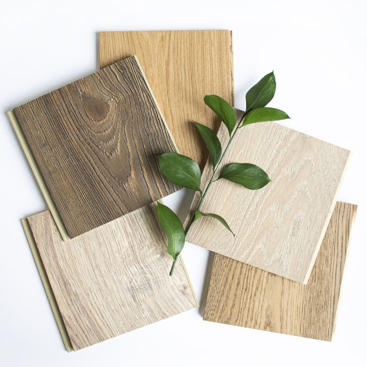 three different types of wood with leaves on them