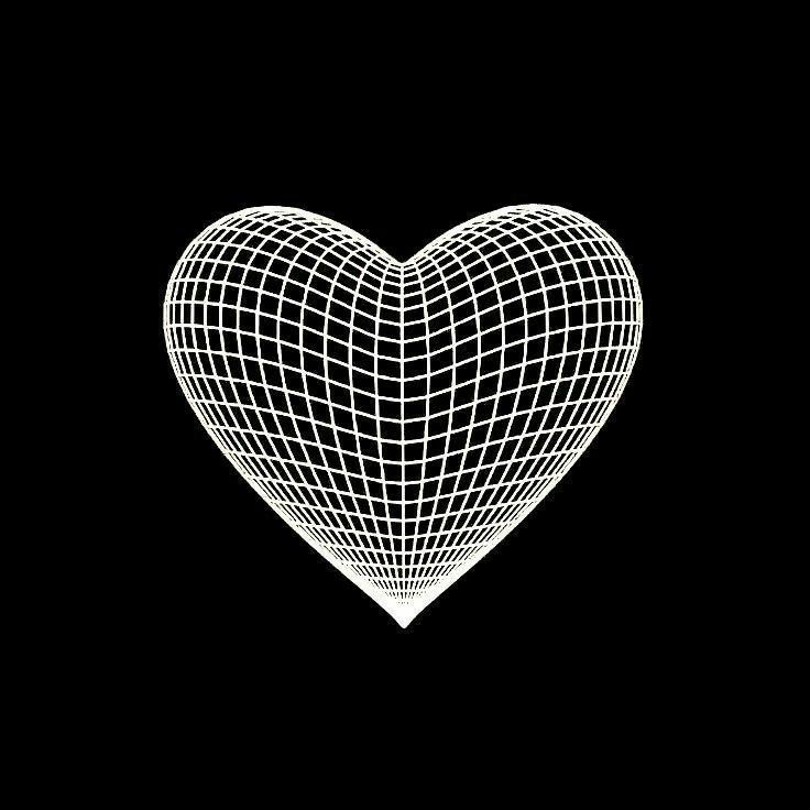 a black and white heart shaped object with squares on it's sides, in the middle