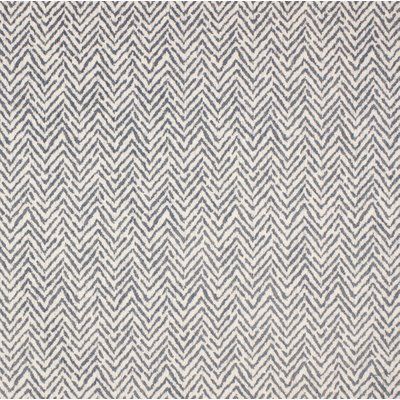 a gray and white rug with an abstract design on it's side, in the shape of zigzag