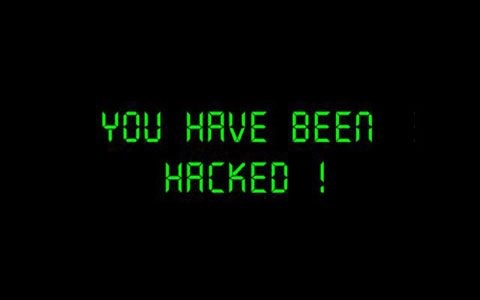 the words you have been hacked written in green on a black background