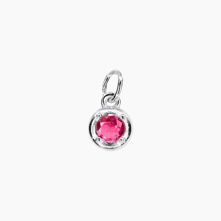 This Birthstone Charm is inspired by the concept of birthstones, precious stones that correspond to different birth months. This sterling silver design features a single, brilliantly cut cubic zirconia in a sparkling diamond-faceted style. A great gift for a friend or loved one, this pendant is a chic choice for every day, you can order other birthstones for even more customization. Also available in Gold *Birthstone Charm only - chain not included. PRODUCT DETAILS Pendant Diameter: 1/4" Stone: Modern Birthstone Gemstones For Anniversary, Modern Anniversary Birthstone Gemstones, Cubic Zirconia Birthstone Jewelry In Diamond White, Diamond White Cubic Zirconia Birthstone Jewelry, Diamond White Birthstone Jewelry In Cubic Zirconia, Classic Birthstone In White Gold Setting, Pink Sterling Silver Birthstone Necklace, Pink Gemstone Birthstone Necklace In Sterling Silver, Classic White Gold Birthstone Gemstones