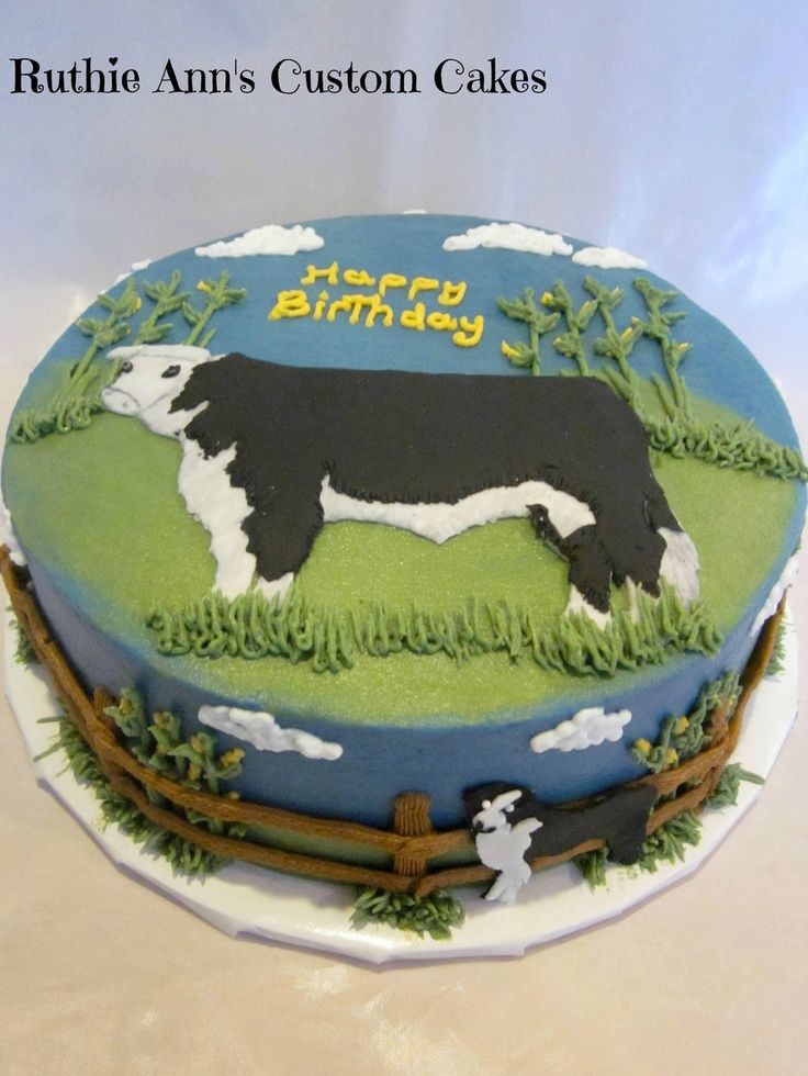 a birthday cake with a cow on it