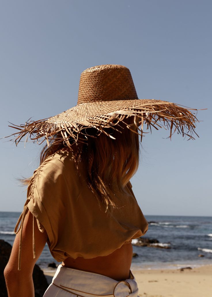 That summer holiday you are dreaming of comes to life through our Isla Hat. it is light weight with a raw-edged straw brim adding fun and texture to its look. Lightweight Made from Straw *Sizes vary, but measure about S/M: 21 IN M/L: 23 IN Bohemian Short Brim Straw Hat For Summer, Bohemian Straw Hat With Short Brim For Summer, Bohemian Summer Straw Hat With Short Brim, Summer Bohemian Straw Hat With Curved Brim, Bohemian Fedora Straw Hat For Summer, Bohemian Sun Hat For Vacation In Warm Weather, Bohemian Straw Panama Hat For Summer, Bohemian Beach Sun Hat, Bohemian Sun Hat For Beach And Warm Weather