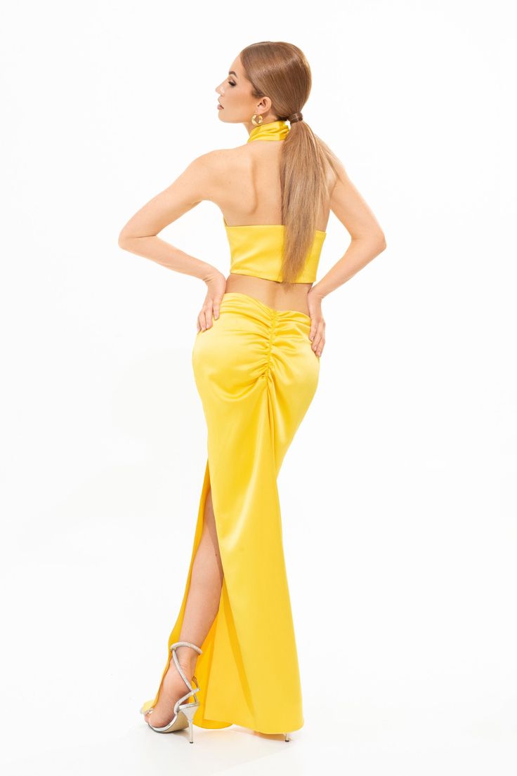 The Exclusive Sunset Crop Top provides a modern refresh to your summer edits. This stylish and innovative piece is made from a double layered stretch satin fabric. Wear it to shape a halter-neckline. Open back zip fastening. Colour: Yellow Composition: Stretch Satin Summer Edits, Stretch Satin Fabric, Colour Yellow, Halter Crop Top, The Invisible, Stretch Satin, Halter Neckline, Satin Fabric, Long Skirt