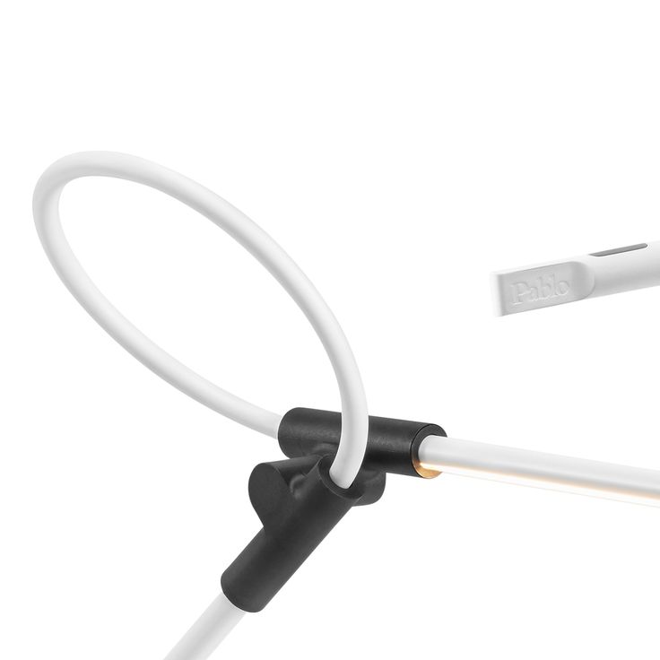 a white and black cord connected to an electronic device