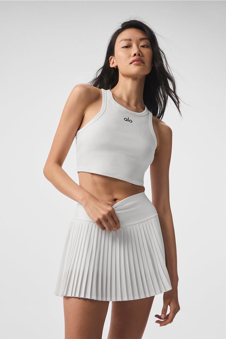 Meet your new go-to, the Aspire Tank. This wear-everyday style goes above and beyond. Designed on-body to fit every size perfectly, with a soft, cropped body and casual ribbing. We love it with high-waist capris & shorts. Super-versatile cropped fit On-trend rib Designed & uniquely fit to flatter every size Wear-tested by our in-house team for the perfect fit Alo Yoga Athleisure Streetwear Tops, Sleeveless Alo Yoga Athleisure Top, Alo Yoga White Stretch Top, Alo Yoga Compressive Athleisure Top, Alo Yoga Sporty Sleeveless Top, Alo Yoga Outfit, Tennis Outfits, Outfits Unique, Outfit References