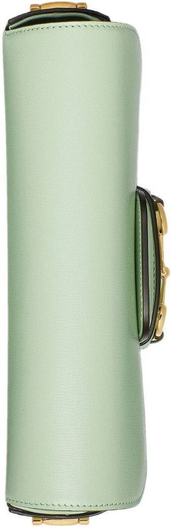 Get ready to turn heads with this elegant mint green leather shoulder bag with signature Horsebit detailing and gold-tone hardware. Secure your belongings with the unique magnetic fastening and stay organized with the main compartment and internal zip pocket. Perfect for any occasion, this luxurious bag is a must-have for adding a touch of style to any outfit. Dimensions: Width: 22.5cm, Height: 13.5cm, Depth: 5.5cm Green Gucci Bag With Detachable Strap, Gucci Green Bag With Detachable Strap, Green Gucci Shoulder Bag For Daily Use, Gucci Green Shoulder Bag For Daily Use, Daily Use Green Gucci Shoulder Bag, Gucci Green Shoulder Bag With Detachable Strap, Formal Green Gucci Shoulder Bag, Green Gucci Bag With Gold-tone Hardware, Gucci Green Bags With Gold-tone Hardware