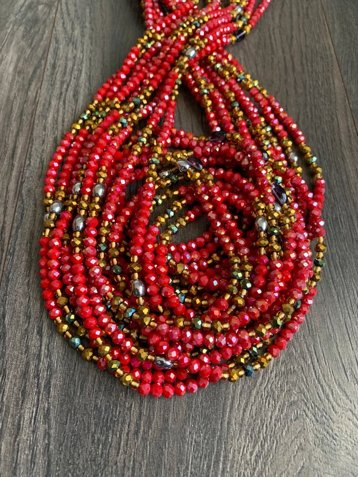 Enjoy these gorgeous WaistBeads made exclusively for you. Uses of Waist beads ★ Cultural and Spiritual Reasons ★Waist beads as ornaments as well as for symbolic adornment, ★ which serves as a sign of wealth, femininity or aristocracy, as well as spiritual well-being. ★ Weight-loss Management ★Self Love/ Confidence ​ Spiritual Red Jewelry With Faceted Beads, Beaded Bohemian Waist Beads As Gift, Bohemian Beaded Waist Beads As A Gift, Spiritual Multi-strand Beaded Crystal Necklaces, Red Spiritual Jewelry With Spacer Beads, Red Crystal Necklaces With Colorful Round Beads, Traditional Red Rondelle Necklaces, Spiritual Style Faceted Round Beaded Necklaces, Spiritual Style Round Faceted Beads Necklace