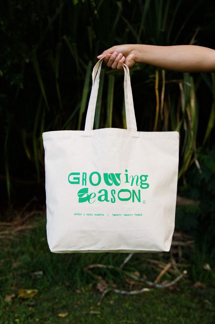 The Growing Season Tote Bag is the perfect everyday companion. Crafted with sturdy cotton canvas and designed with a larger size (20"w, 15"h, 5"d) it can fit all your daily essentials, and any supplies you may need on your adventures. Eco-friendly Cotton Canvas Bag With Removable Pouch, Cotton Travel Bag With Removable Pouch, Cotton Travel Bag With Canvas Lining For Weekend Trips, Eco-friendly Canvas Bags With Canvas Lining, Rectangular Cotton Travel Bag For Weekend Trips, Travel Bag With Removable Pouch Made Of Cotton, Cotton Shoulder Bag With Canvas Lining, Cotton Travel Tote Bag With Canvas Lining, Cotton Travel Tote With Canvas Lining