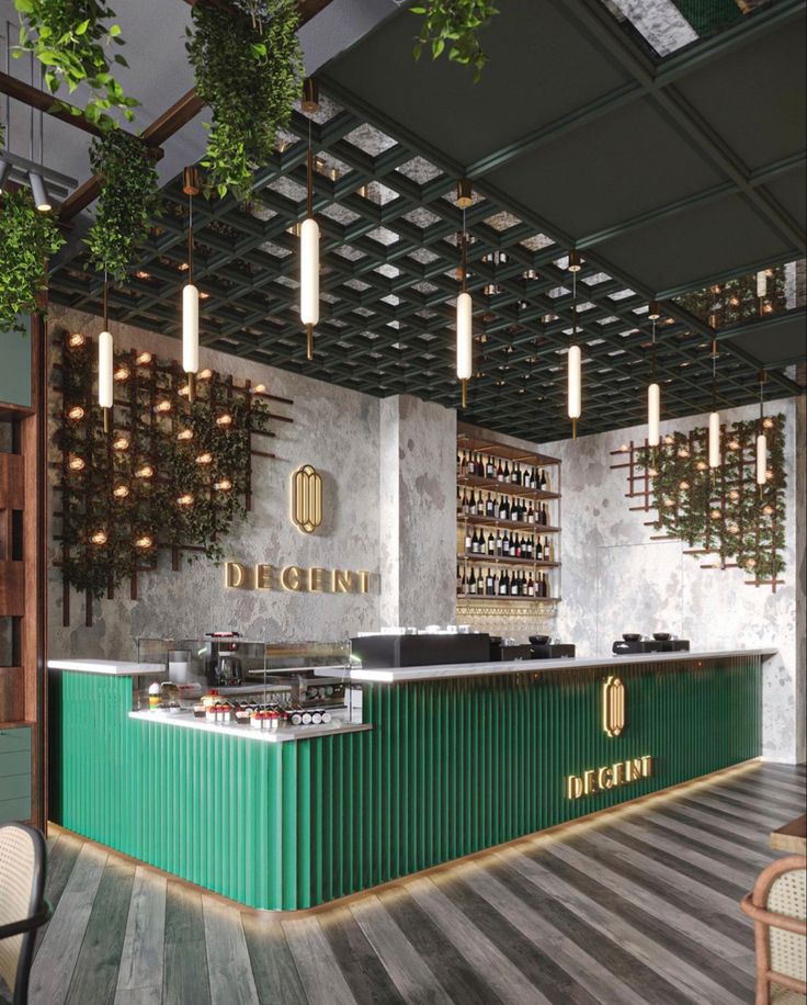 the interior of a restaurant with wooden floors and green counter tops, hanging plants on the ceiling