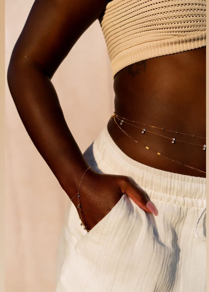 Simple and dainty, this gold belly chain can be worn in so many ways. Wear it with a dress or swimsuit to add the perfect touch of glitz to your vacation style. 18K gold plated on stainless steel. Comes in 4 different size 24", 26", 28" & 30" Extender: 6" Belly Chain Black Women, Gold Body Chain, Waist Jewelry, Inexpensive Clothes, Belly Chain, Where To Shop, Blazer With Jeans, Product Recommendations, Shopping Tips