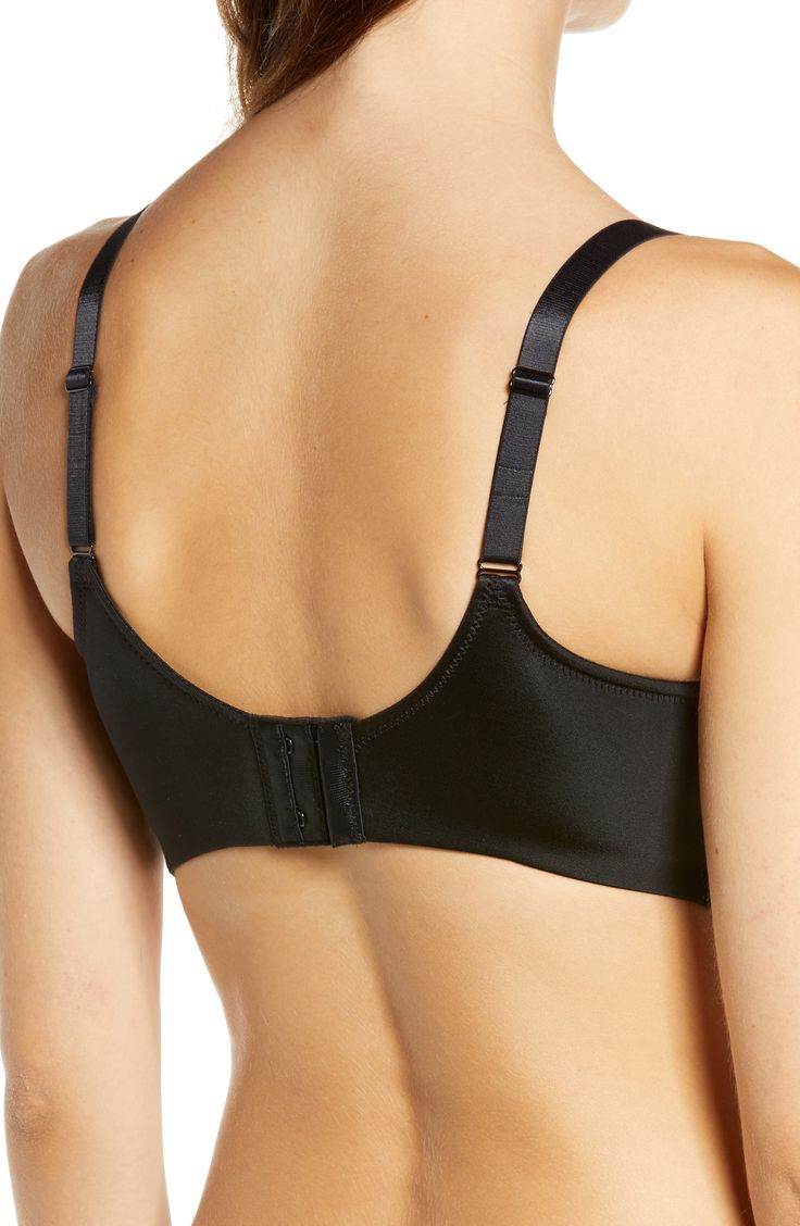 This lightweight yet powerful bra is designed to lift the bustline up to one inch while a wire-free band contours to your body so it never pinches or restrains. 55% nylon, 45% spandex Hand wash, line dry Imported Black Full Coverage Sports Bra With Built-in Bra, Supportive Full Coverage Bra With Padded Cups, Full Coverage Shaping Nursing Bra With Padded Cups, Shaping Full Coverage Nursing Bra With Padded Cups, Supportive Black Bra With Removable Pads, Supportive Full Cup Bra With Removable Pads, Full Coverage Nursing Bra With Adjustable Straps And Shaping, Supportive Padded Full Coverage Bra, Shaping Underwire Nursing Bra With Medium Support