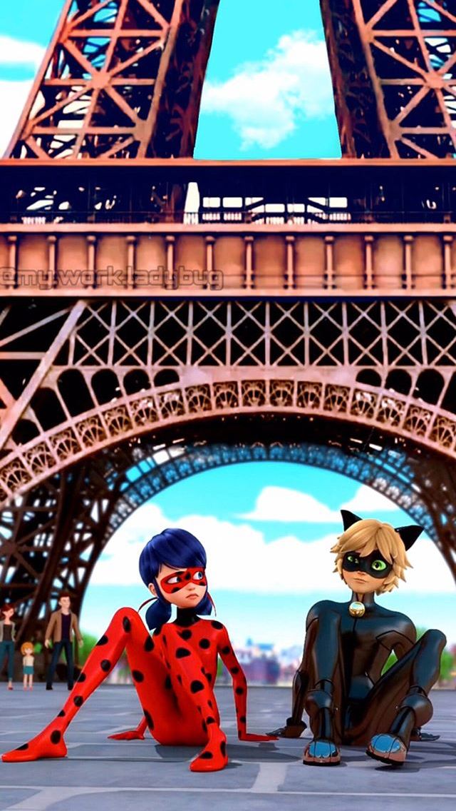 two cartoon characters sitting in front of the eiffel tower