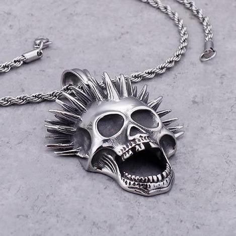 Even the dead have their dose of madness. This punk necklace with an eccentric cut is perfect for those who aren't afraid of other people's gaze! This punk skull necklace is a must for punk people, for people fond of Blink-185 or even Sum 41. As you may have noticed, it is totally painted in silver, making this necklace a unique and really attractive jewel for punk people and their black outfits. Also, as you can see, it has a foxtail bead attached to a screaming skeleton head with punk liberty Punk Necklaces For Halloween Concert, Punk Style Necklaces For Halloween Concert, Alternative Necklaces For Halloween Concert, Alternative Halloween Necklaces For Concerts, Gothic Necklace For Halloween Concert, Punk Style Jewelry For Halloween Concert, Grunge Necklaces For Halloween, Alternative Style Necklaces For Halloween, Alternative Halloween Necklaces