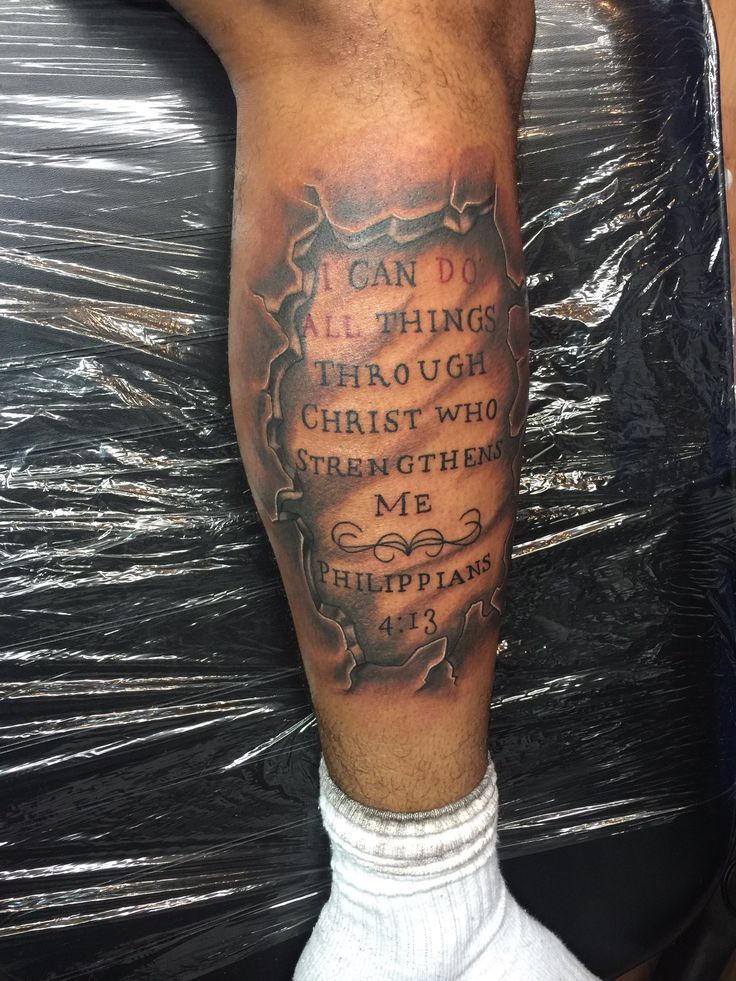 a man's leg with a bible verse tattoo on it and the words i can do all things through christ who straightens me