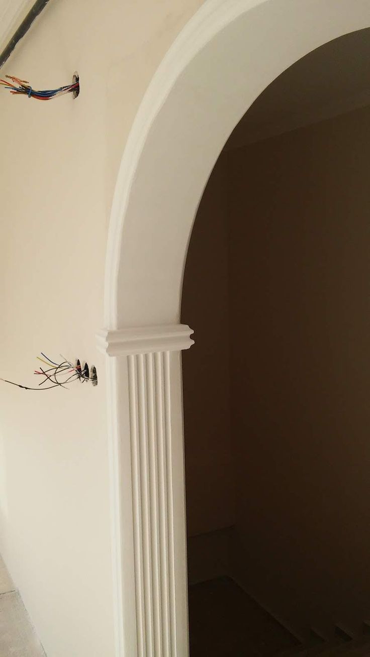 an archway between two walls in a house