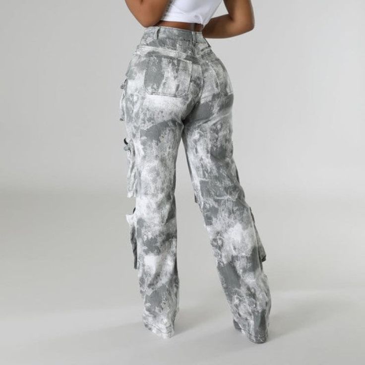 These Revealing Foil Cargo Pants showcase a distinctive washed grey design with oversized pockets that enhance both style and utility. Constructed from resilient fabric, they deliver comfort and adaptability for everyday wear. Material: Crafted from durable, resilient fabric for lasting wear and comfort. Pattern: Features a unique washed grey pattern for a standout look. Pockets: Includes multiple oversized pockets for added functionality and convenience. Design: Versatile design that pairs well Gray Baggy High Waist Cargo Jeans, Acid Wash Straight Leg Bottoms With Cargo Pockets, Spring Gray Cargo Jeans, Trendy Acid Wash Pants With Pockets, Gray Baggy Straight Leg Cargo Jeans, Baggy Gray Cargo Pants With Pockets, Acid Wash Full-length Cotton Pants, High Waist Acid Wash Pants With Pockets, Gray High Rise Bottoms For Streetwear