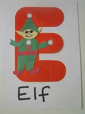 the letter e is for elf with an elf on it's face and hands