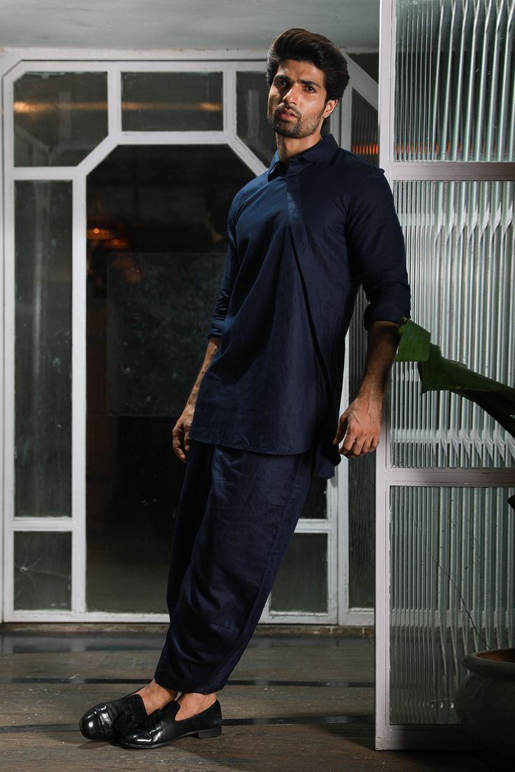 Blue linen small collared side extended placket kurta. Paired with dhoti pant.
Component: 2
Pattern: Plain
Neckline: Small Collar
Sleeve Type: Full
Fabric: Linen
Color: Blue
Other Details: 
Panelled kurta
Occasion: Sangeet - Aza Fashions Plain Kurta, Dhoti Pants, Linen Color, Fashion App, Pant Set, Aza Fashion, Sleeve Type, Pants Set, Types Of Sleeves