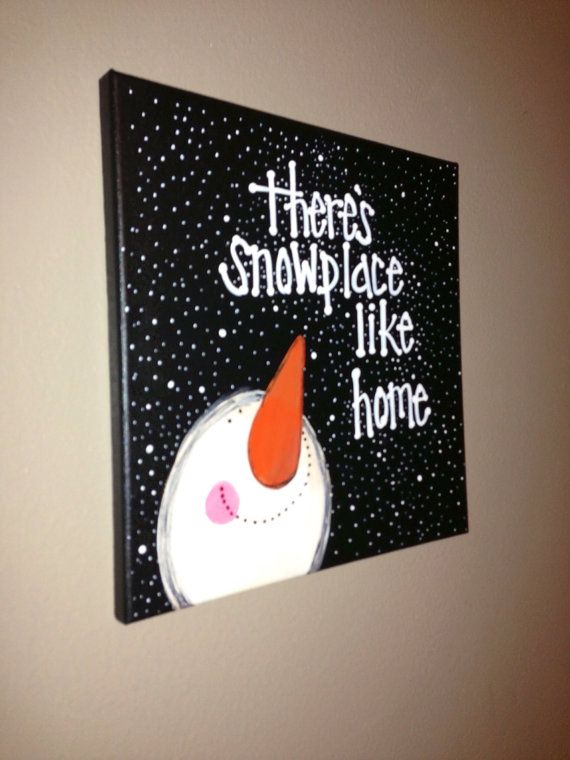 there's snowplace like home painted on a canvas mounted to the wall