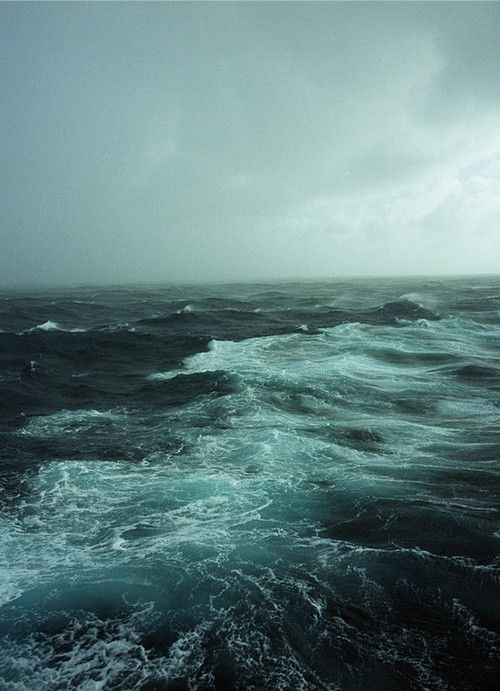 black and white photograph of waves in the ocean