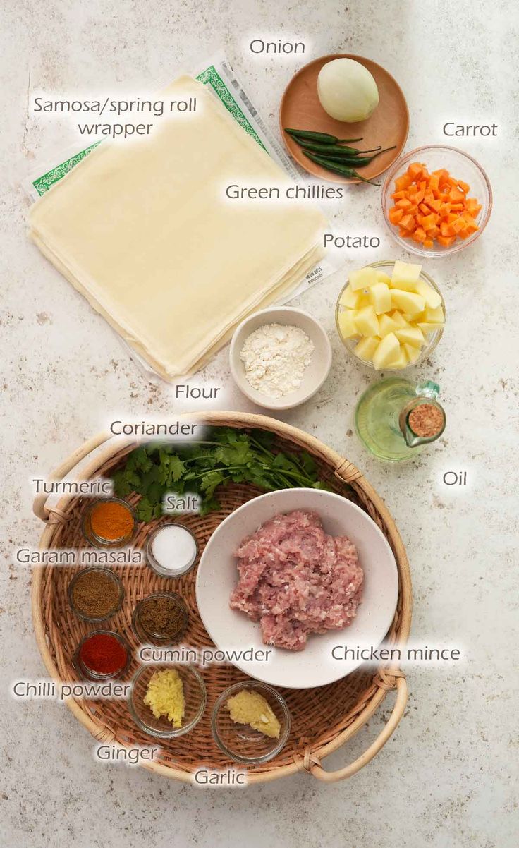 the ingredients for this dish are laid out in bowls