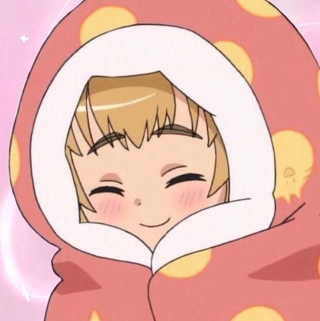 a cartoon girl with blonde hair wearing a pink and yellow blanket