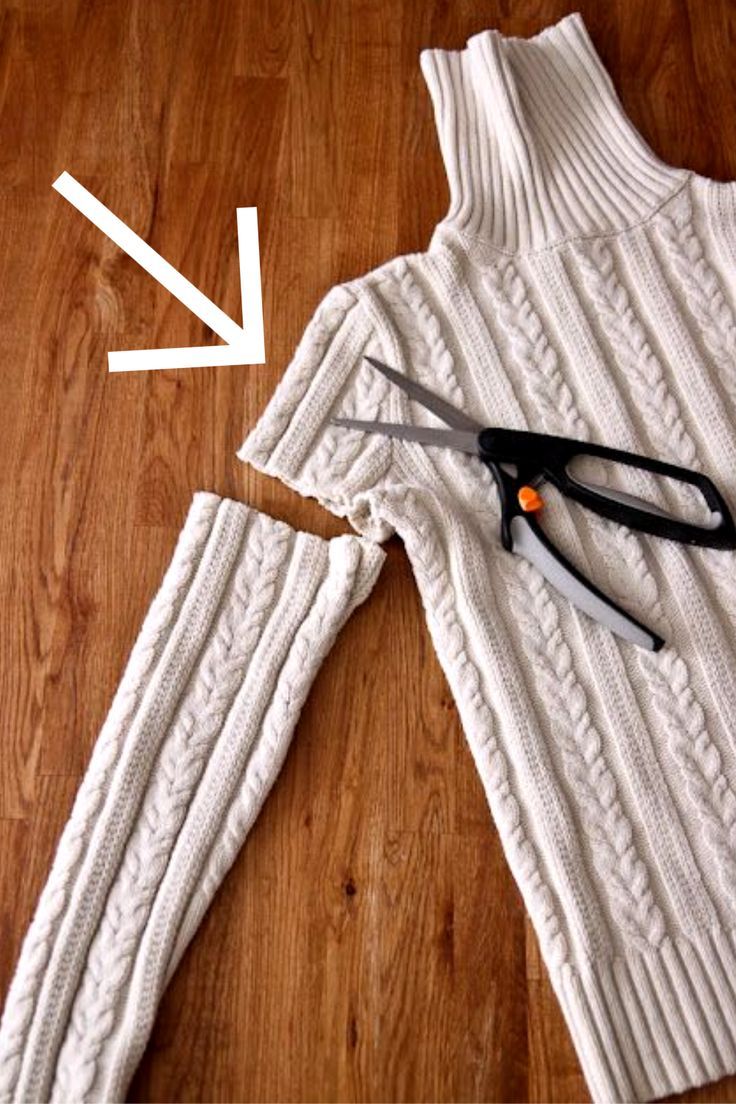 scissors are used to cut the sweater off and put it in place on the floor