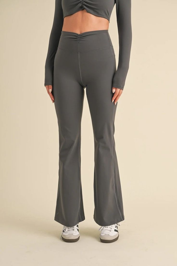 Ruched Waist Flare Leggings | Evercado Sporty Stretch Leggings With Ribbed Waistband, Sporty Stretch Tights With Elastic Waistband, Full Length Activewear For Yoga In Fall, Stretch Gray Sweatpants For Fall, Stretch Activewear For Pilates In Fall, Versatile Yoga Pants With Ribbed Waistband, Full Length Compression Yoga Pants With Ribbed Waistband, Fitted Tights For Gym In Fall, Versatile Yoga Pants With Ribbed Waistband For Workout