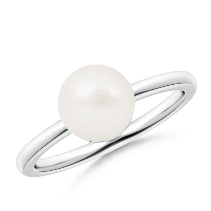 Set on silver band is a Freshwater pearl glowing magnificently. The glossy round pearl resembles the full moon and captivates the senses with its sheer elegance. It's a classic pearl ring that accessorizes well with every outfit. Classic White Gold Pearl Drop Ring, Classic White Gold Pearl Ring With Pearl Drop, Classic Pearl Drop Ring, Classic Pearl Ring With Pearl Drop, Classic Round Pearl Ring With Pearl Drop, White Pearl Drop Ring For Formal Occasions, Formal White Pearl Ring, White Gold Pearl Ring With Pearl Drop, Timeless White Gold Pearl Ring With Round Band