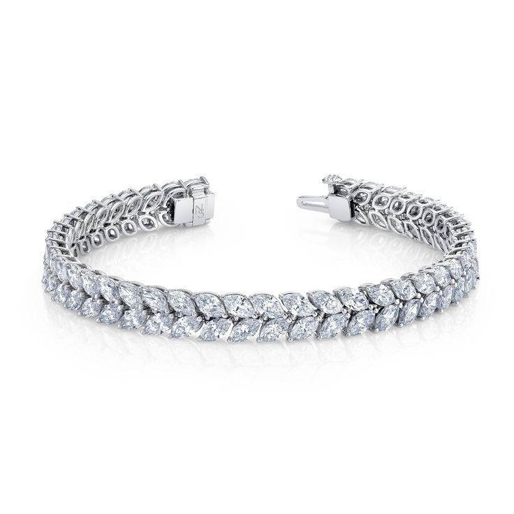 Shop our exquisite Marquise Cut jewelry line crafted from 18k white gold. The stunning rows of diamonds will add elegance and luxury to any outfit. Shop now and elevate your style. Outfit Shop, Marquise Cut Diamond, Marquise Cut, Elevate Your Style, Diamond Bracelet, Diamond Cuts, Diamonds, White Gold, Bracelet