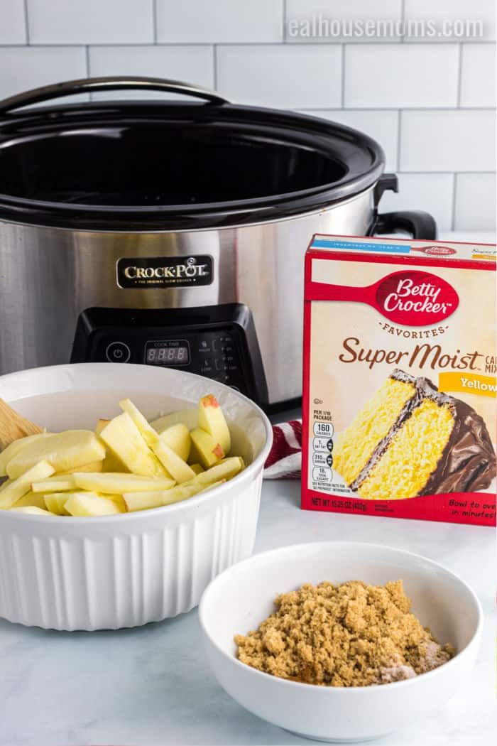 ingredients to make crock pot cake in front of an instant pressure cooker and bowl