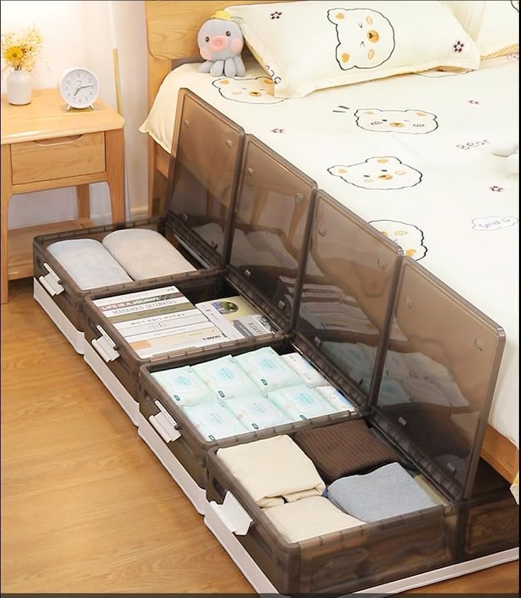 the bed is made up and has several compartments for diapers to be placed in