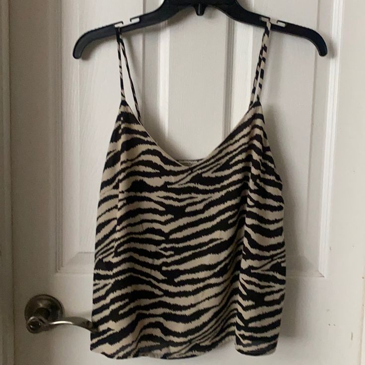 Looks Brand New, Lined Adorable Animal Print Out Tank Shirt. Maybe Worn Once. Chic Summer Tops With Zebra Print, Casual Zebra Print Tops For Spring, Casual Summer Blouse With Zebra Print, Zebra Print Summer Vacation Top, Summer Vacation Zebra Print Top, Trendy Zebra Print Summer Top, Chic Tiger Print Tops For Spring, Casual Tiger Print Tops, Casual Tiger Print Tops For Spring