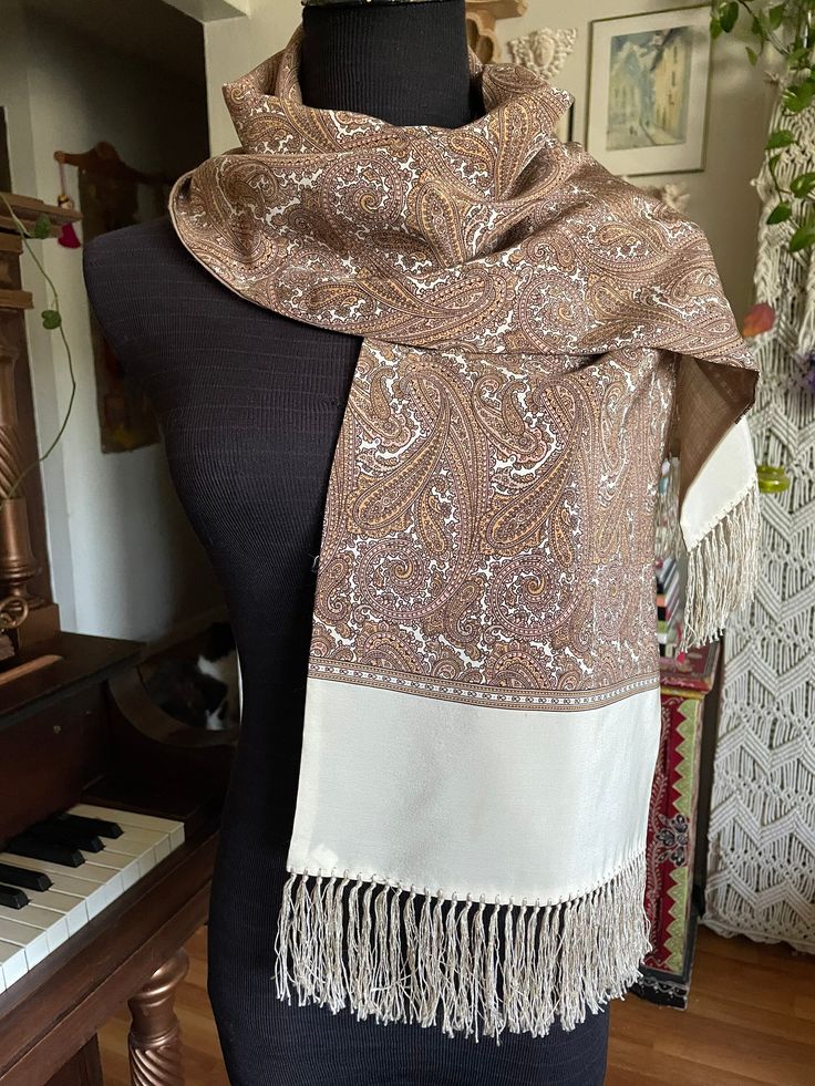 "Absolutely gorgeous and classy silk and wool scarf with paisley pattern and hand made silky fringes  Has two wearable sides, one is silk with paisley pattern and the other one is thin beige wool Color: refined shades of pastel orange, beige, ivory  Size: 53\" (59\" measured including fringes)x 11\" Excellent condition" Shades Of Pastel, Pastel Orange, Paisley Scarves, Fringe Scarf, Wool Scarf, Paisley Pattern, Scarf Wrap, Scarf Accessory, Paisley