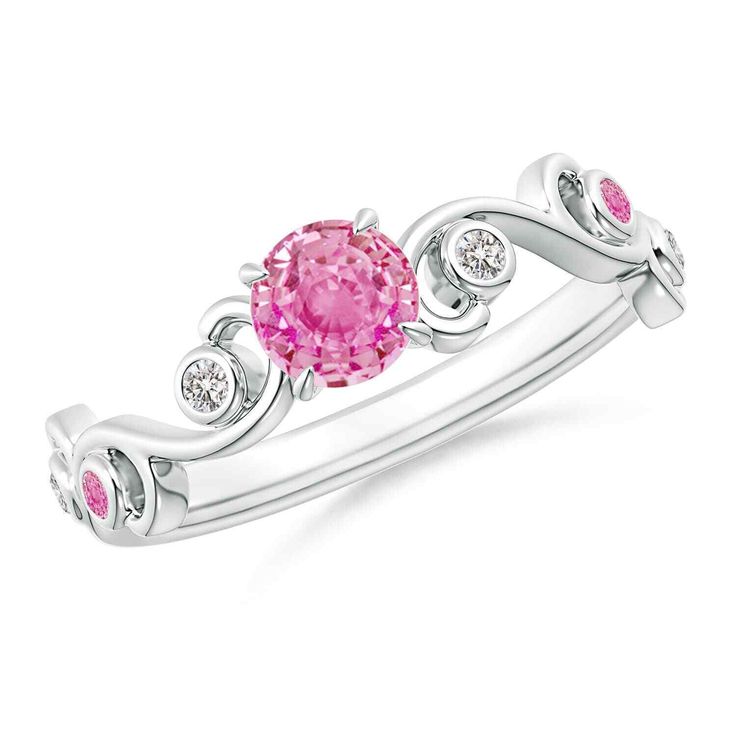 Elegant like the vines of ivy, this is a round pink sapphire solitaire ring in 14K Solid Gold. The blossomy pink sapphire in claw setting is enhanced by bezel set pink sapphires and diamonds on the swirling scroll shank. Birthstone for the month of September and traditional gemstone gift for 5th & 45th wedding anniversaries. All our items are packaged with care in appealing boxes with plush interiors. Available in various sizes between size 3 to 13. Please contact us for more info. Features 0.65 Scroll Ring, Sapphire Solitaire Ring, Nature Inspired Rings, September Birthstone Jewelry, Sapphire Solitaire, Pink Sapphire Ring, Rings For Girls, Pink Ring, Diamond Solitaire Rings