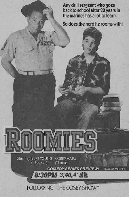 an advertisement for the comedy show roomies featuring two men sitting on suitcases and one man standing next to him