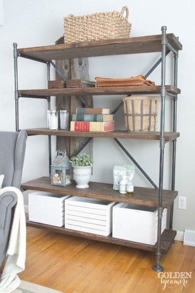 a book shelf with baskets and books on it