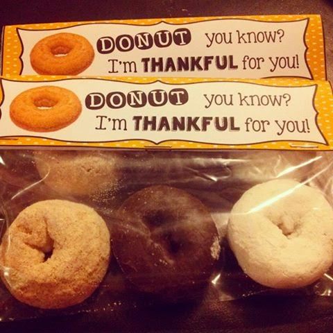 three doughnuts in a plastic bag with thank you for your donut message