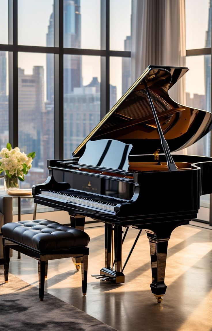 a grand piano is in the middle of a living room with large windows and a city view