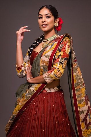 Maroon base attached cancan lehenga with humans and animals kalamkari hand painted patterns and embroidery. Paired with padded maroon blouse embroidered with glass beads and creme printed dupatta with contrast border. - Aza Fashions Cape Lehenga, Kurta Lehenga, Maroon Blouse, Lehenga Pattern, Lehenga Skirt, Fashion App, Bridal Lehenga, Embroidered Blouse, Three Quarter Sleeves