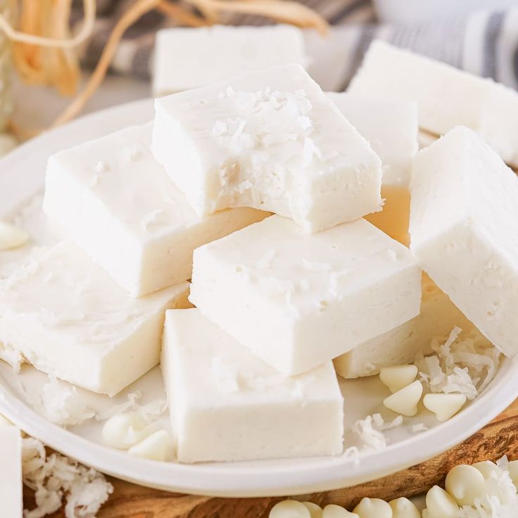 several pieces of tofu on a white plate