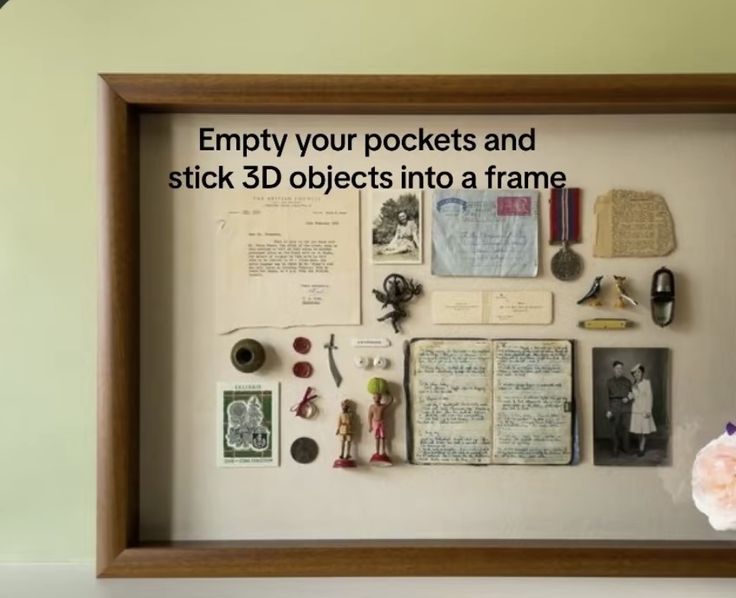 a wooden frame with pictures and other items on it that says enjoy your pockets and stick 3d objects into a frame