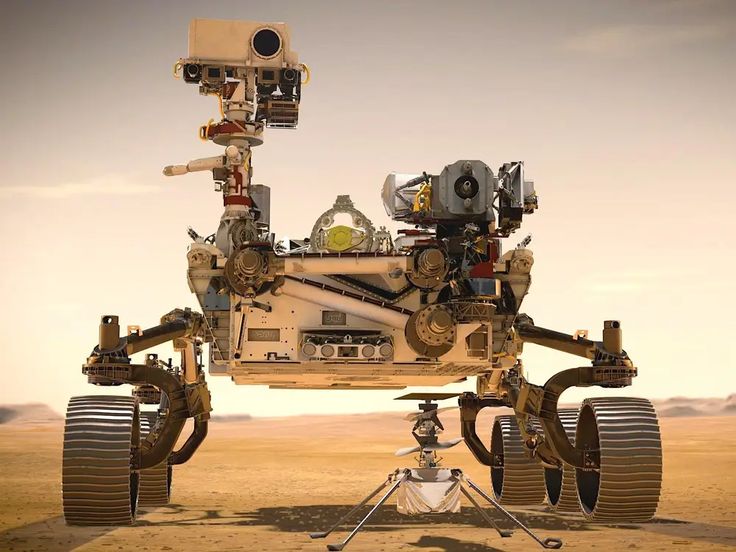 an image of a robotic vehicle in the middle of the desert with wheels attached to it