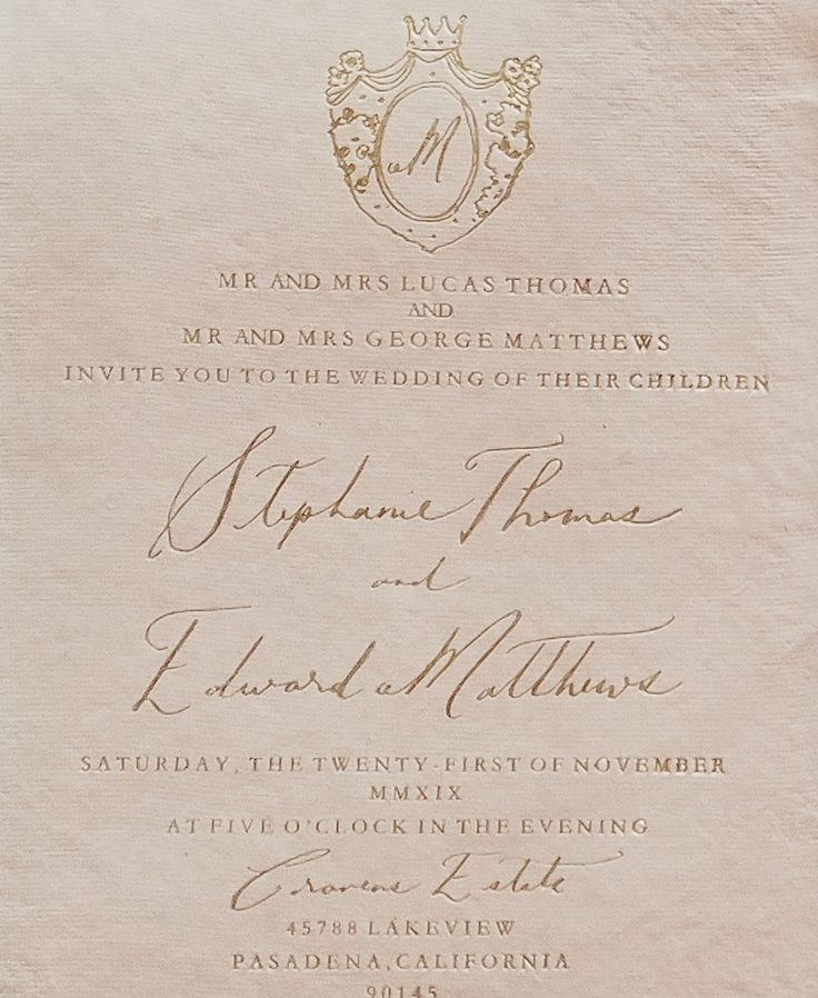 an old wedding card with a crown on it