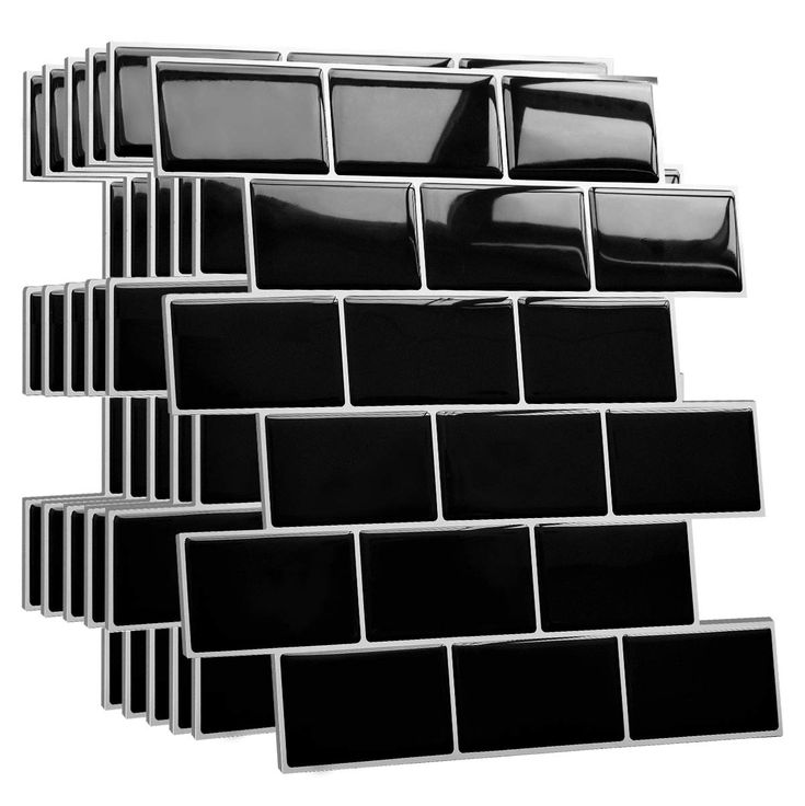 a stack of black and white tiles on top of each other in the shape of a rectangle