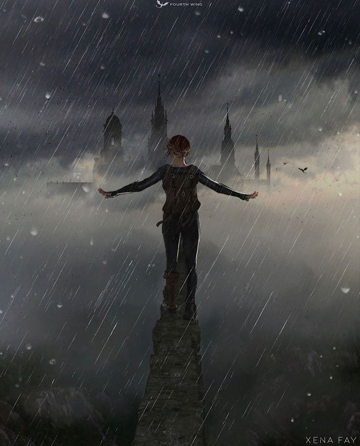 a person standing on top of a tower in the rain