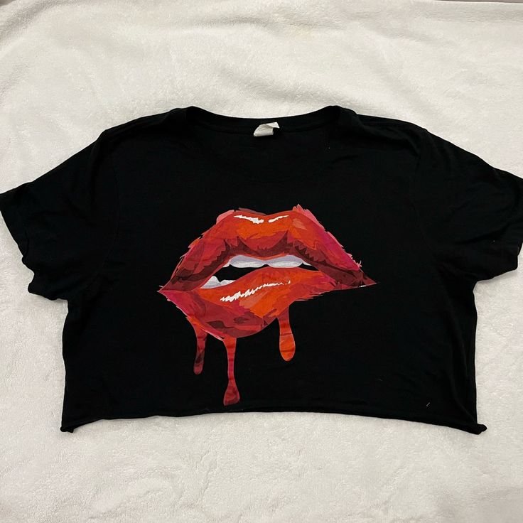 Cropped Lips T-Shirt From Windsor Size Medium. Falls Just Below Bra Line And Fits Size M/L. Never Worn. Black Graphic Tee Crop Top For Summer, Trendy Black Tops With Graphic Design, Trendy Black Graphic Design Tops, Black Grunge Tops With Graphic Design, Trendy Red Tops With Graphic Design, Trendy Red Graphic Design Tops, Trendy Black Crew Neck Crop Top, Black Graphic Tee Crop Top With Short Sleeves, Black Cotton Crop Top With Screen Print