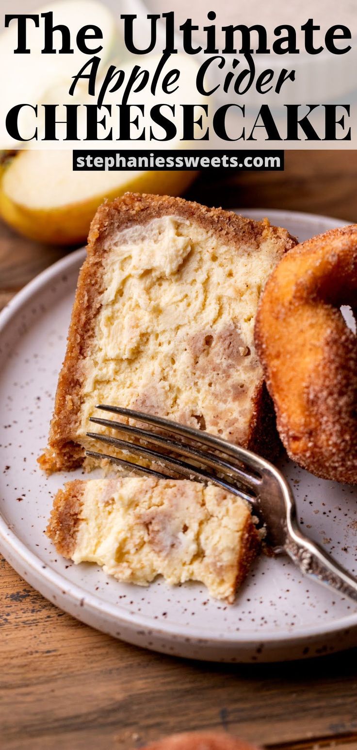 the ultimate apple cider cheesecake is on a plate with a fork next to it