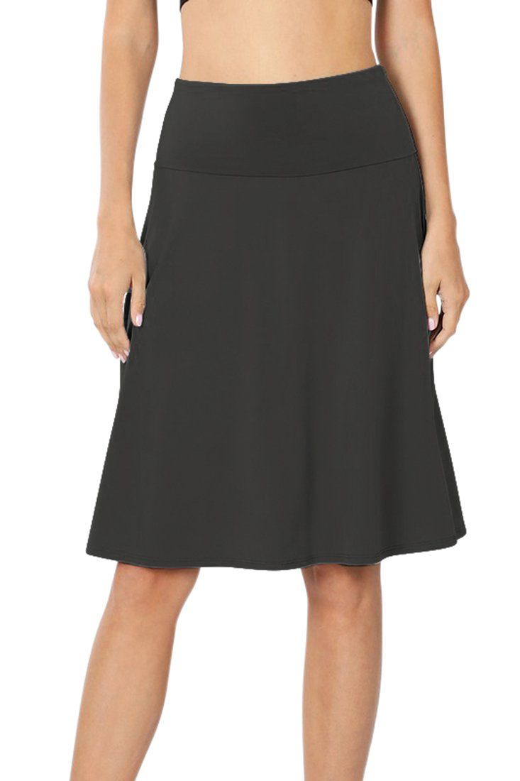 Comfortable A-line skirt that sits around the knees. Made from quality ITY Polyester fabric, for comfort and luxury. Fold over waistband midi skirt. Pull over closure.

 Fabric: 95% Polyester | 5% Spandex | Premium ITY (Interlock Twist Yarn) Fabric 
 High Waist | Optionable Foldover Elastic Waistband | Stretchy waistband allows for comfort and stays up without rolling down 
 Super Soft ITY Polyester | Knee Length | Flared Midi Swing Skirt 
 Durable Material | Solid | Basic Essential | Flowy and Bohemian Maxi, Bohemian Maxi Dress, Everyday Basics, Designs For Dresses, Straight Skirt, Knee Length Skirt, Small Waist, Fold Over, Short Girls